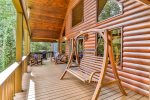 Enjoy The Front Porch Swing While Look Over The View